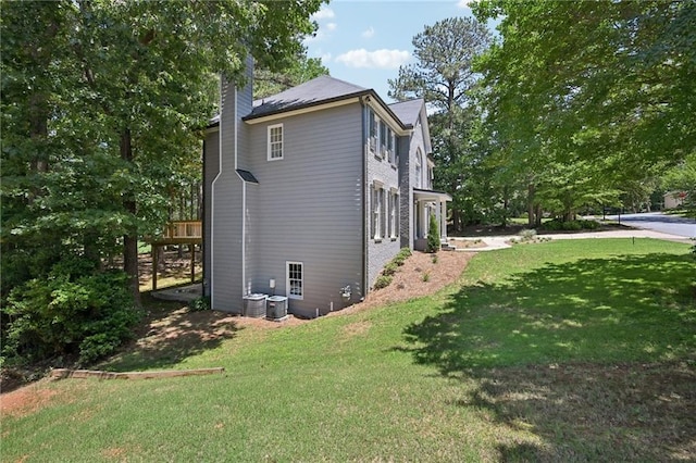 5702 Brynwood Cir NW, Acworth, GA 30101 - view of property exterior featuring a chimney and a lawn