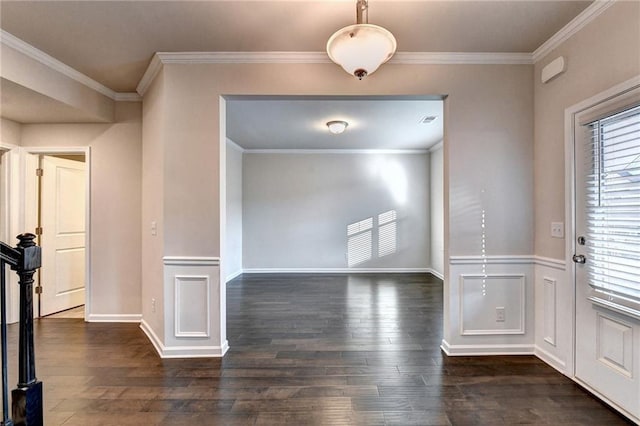 entryway featuring crown molding and dark wood-type flooring