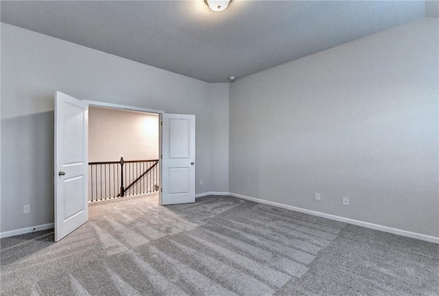 empty room with carpet flooring