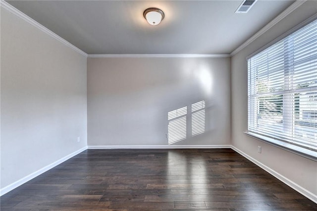 spare room with dark hardwood / wood-style floors and ornamental molding