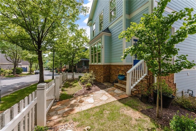 1560 Gilstrap Ln NW, Atlanta, GA 30318 - view of side of home with stone siding