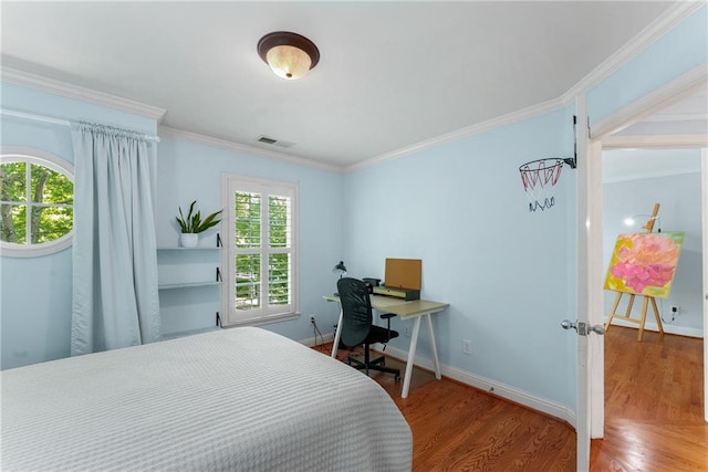 1560 Gilstrap Ln NW, Atlanta, GA 30318 - bedroom featuring wood finished floors, crown molding, and an office area