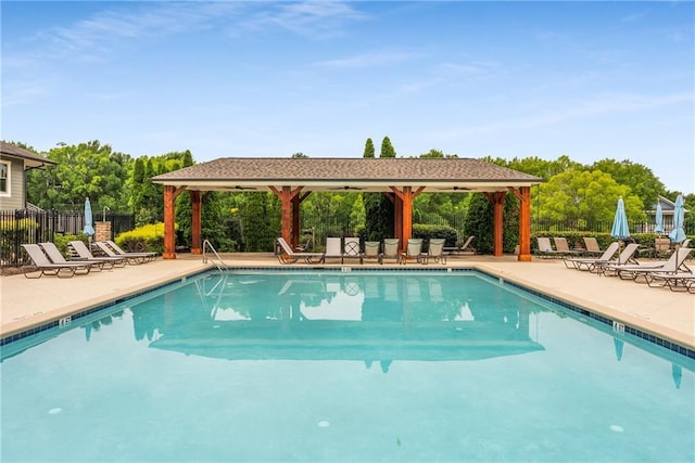 1560 Gilstrap Ln NW, Atlanta, GA 30318 - community pool featuring a patio area, a ceiling fan, and a gazebo