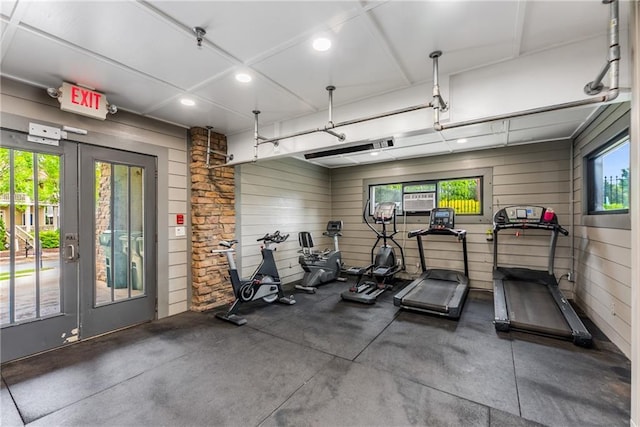 1560 Gilstrap Ln NW, Atlanta, GA 30318 - gym featuring french doors, recessed lighting, and wood walls