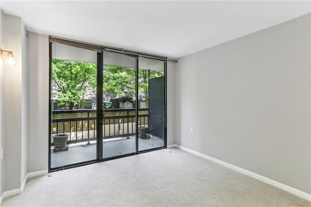 1130 Piedmont Ave NE Unit 410, Atlanta, GA 30309 - empty room featuring baseboards and carpet