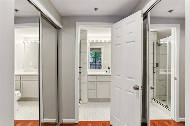 1130 Piedmont Ave NE Unit 410, Atlanta, GA 30309 - bathroom featuring vanity and a shower stall