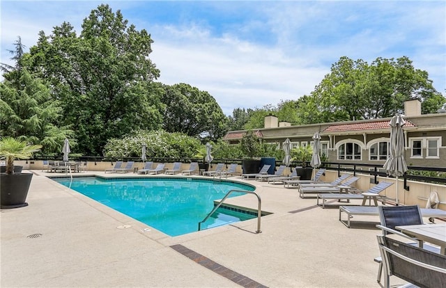 1130 Piedmont Ave NE Unit 410, Atlanta, GA 30309 - pool featuring fence and a patio area