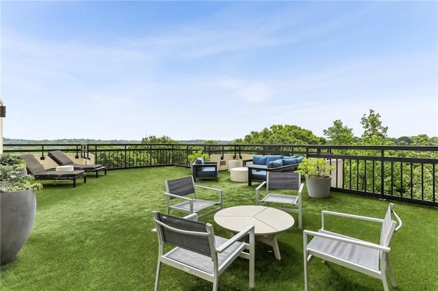 1130 Piedmont Ave NE Unit 410, Atlanta, GA 30309 - view of yard featuring an outdoor hangout area