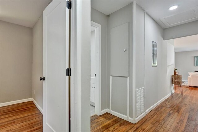 hallway featuring hardwood / wood-style floors