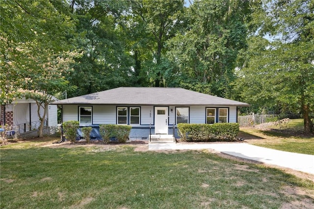 single story home with a front lawn, crawl space, a porch, and fence