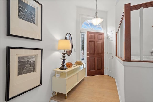 entryway with light wood-style flooring