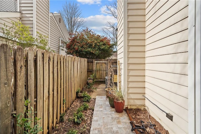 view of yard featuring a patio area and a fenced backyard