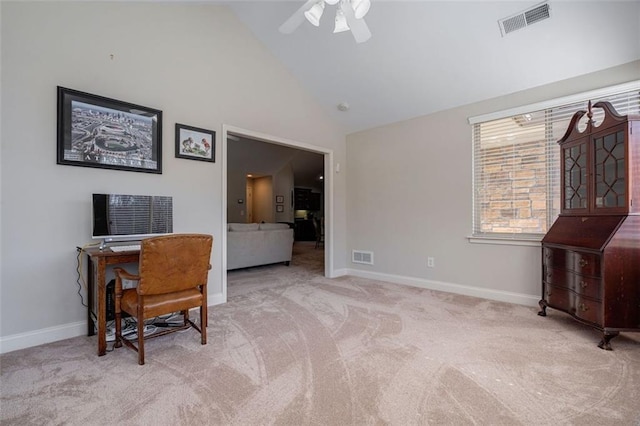 office space featuring visible vents, ceiling fan, baseboards, and carpet