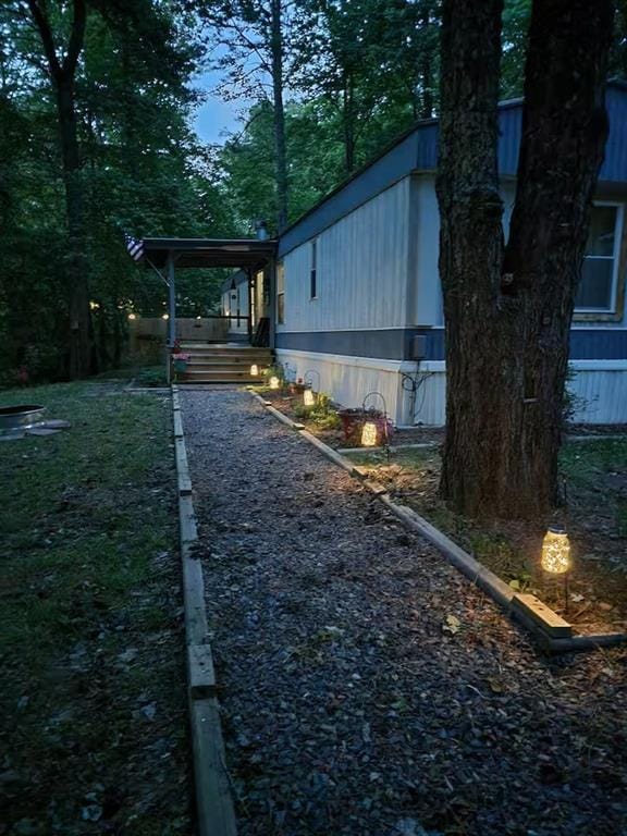 view of yard with a carport