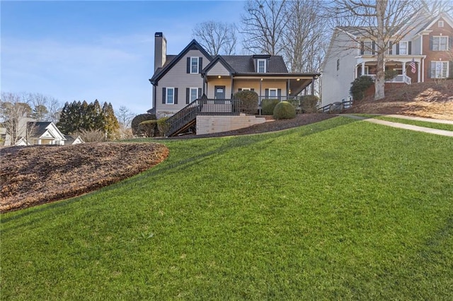 view of front of house featuring a porch and a front lawn