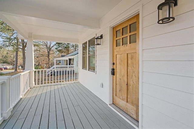 wooden deck featuring a porch