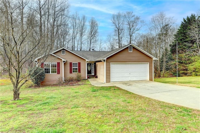 ranch-style home featuring driveway, an attached garage, and a front lawn