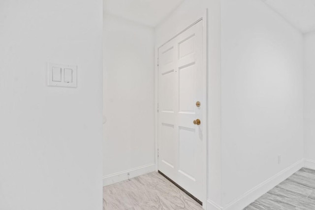 interior space with baseboards