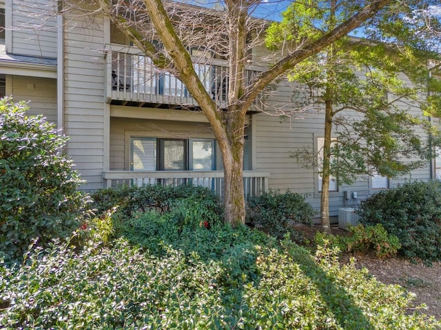 view of property exterior with a balcony