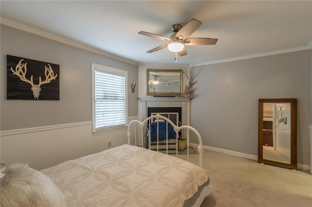 bedroom featuring ceiling fan, crown molding, and light carpet