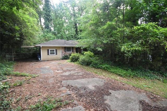1847 Colt Dr, Brookhaven, GA 30341 - view of front of house featuring a wooded view
