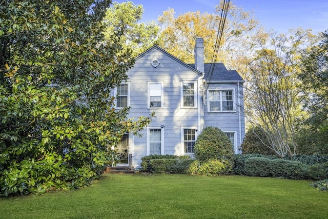 view of front of home with a front yard