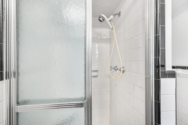 bathroom with an enclosed shower