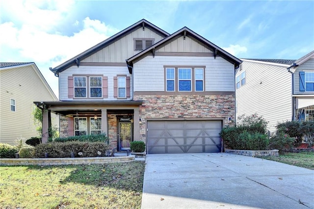 craftsman-style house with a garage and a front lawn