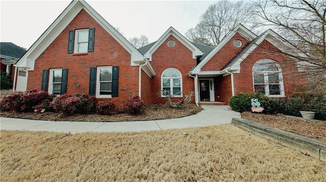 front facade with a front yard