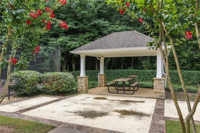 view of property's community featuring a gazebo and a patio