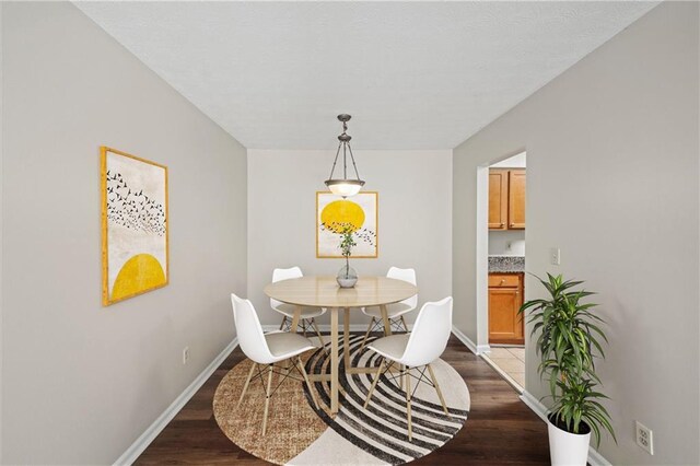 dining room featuring wood-type flooring