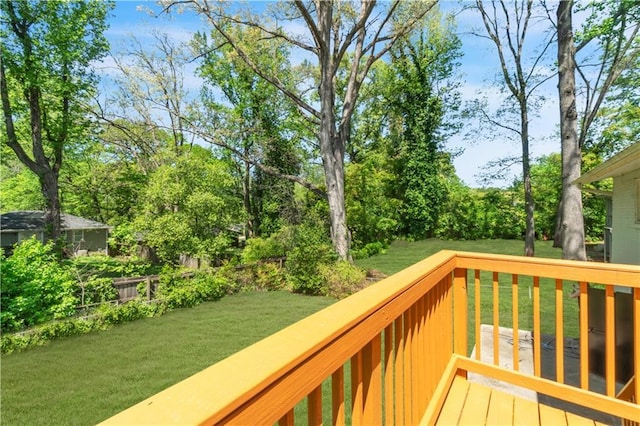 wooden deck with a yard