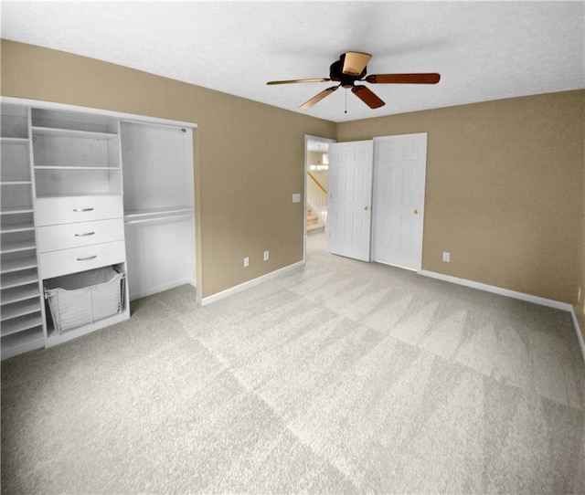 unfurnished bedroom featuring a closet, ceiling fan, and light colored carpet