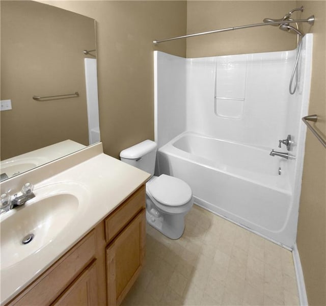 full bathroom featuring vanity, toilet, and washtub / shower combination