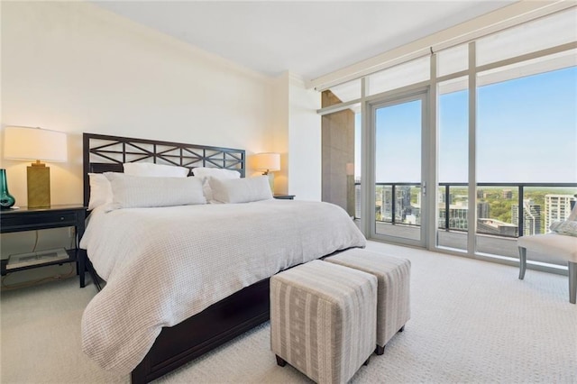 3630 Peachtree Rd NE Unit 2305, Atlanta, GA 30326 - carpeted bedroom featuring expansive windows and access to exterior