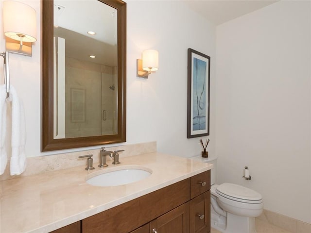 full bathroom featuring recessed lighting, toilet, a stall shower, vanity, and tile patterned flooring