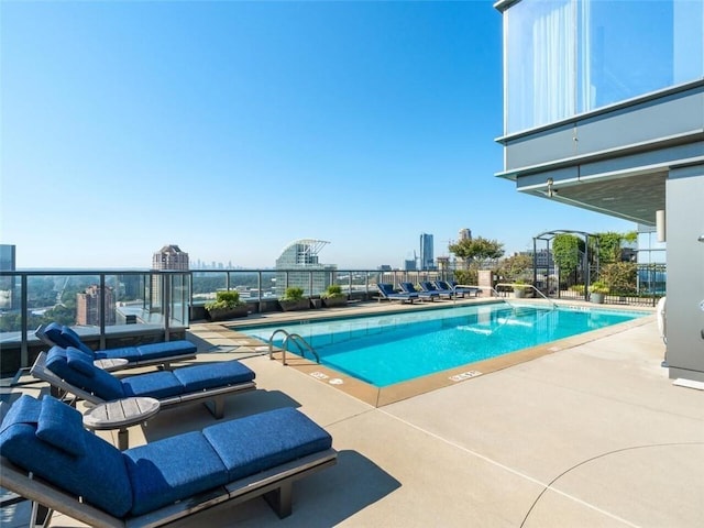 3630 Peachtree Rd NE Unit 2305, Atlanta, GA 30326 - community pool featuring a patio area and a city view