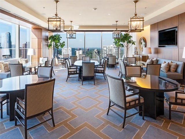 3630 Peachtree Rd NE Unit 2305, Atlanta, GA 30326 - carpeted dining area featuring a chandelier