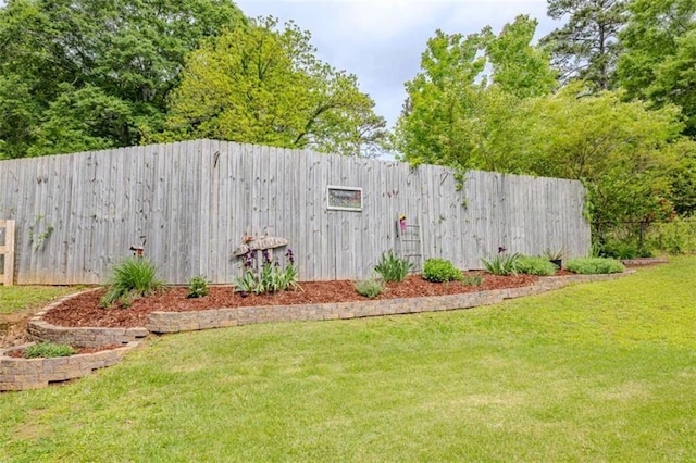 view of yard featuring fence