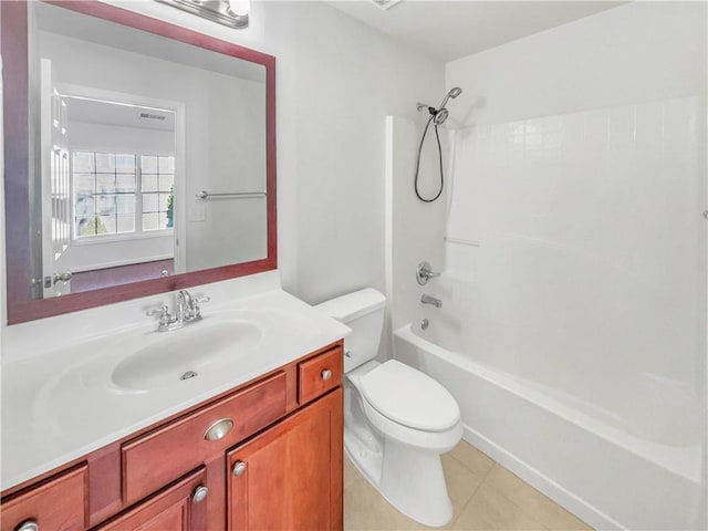 bathroom with tile patterned floors, shower / bathing tub combination, toilet, and vanity
