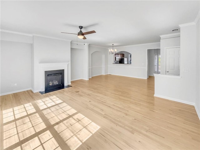 unfurnished living room with a fireplace with flush hearth, ceiling fan with notable chandelier, light wood-type flooring, and baseboards