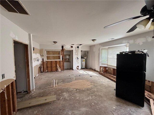 1106 Donnelly Ave SW, Atlanta, GA 30310 - kitchen featuring water heater, ceiling fan, and freestanding refrigerator
