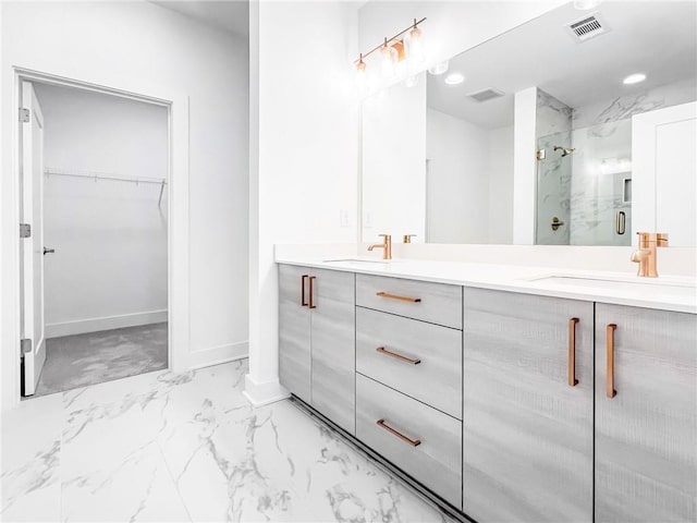 bathroom with an enclosed shower and vanity