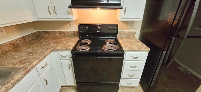 5595 Marbut Rd, Lithonia, GA 30058 - kitchen featuring black appliances, extractor fan, light countertops, and white cabinetry