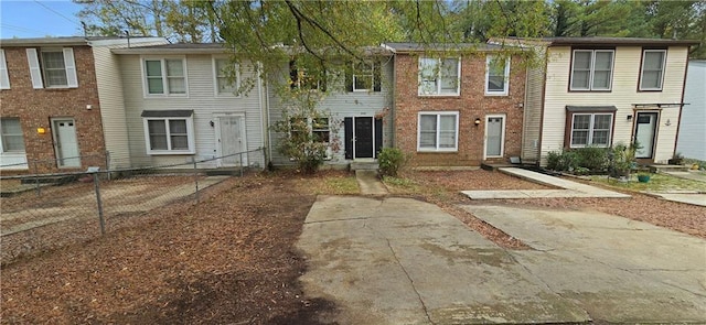 5595 Marbut Rd, Lithonia, GA 30058 - townhome / multi-family property featuring brick siding
