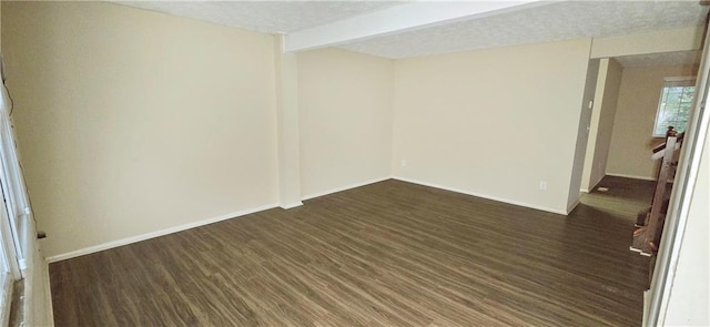5595 Marbut Rd, Lithonia, GA 30058 - spare room with wood finished floors and a textured ceiling