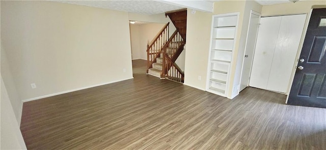 5595 Marbut Rd, Lithonia, GA 30058 - entrance foyer featuring wood finished floors and stairway