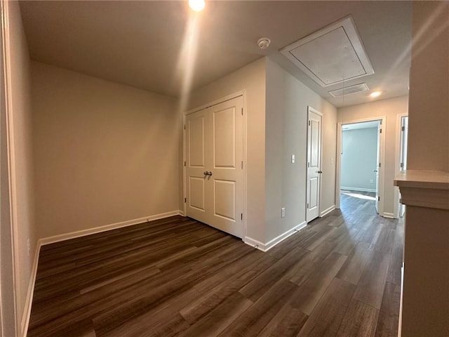 8664 Webb Rd, Riverdale, GA 30274 - unfurnished room with attic access, dark wood-type flooring, baseboards, and a smoke detector
