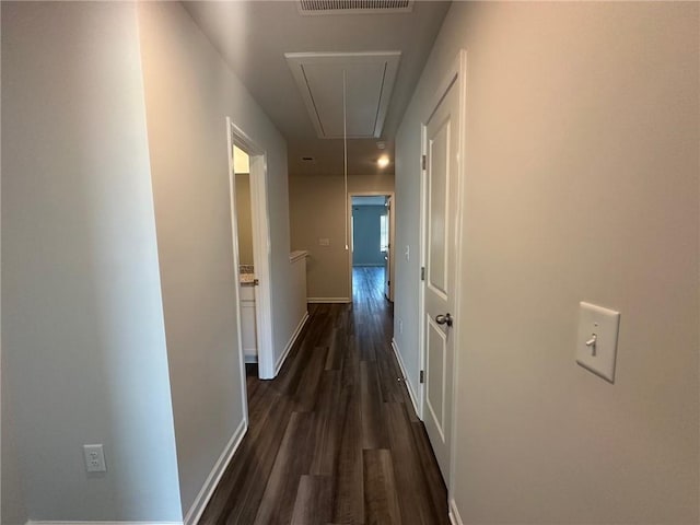 8664 Webb Rd, Riverdale, GA 30274 - hallway with attic access, dark wood-type flooring, and baseboards