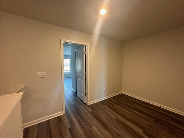 8664 Webb Rd, Riverdale, GA 30274 - spare room with dark wood-style flooring and baseboards